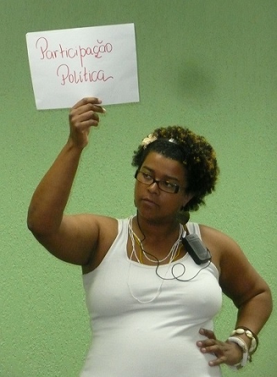 WLP Brazil/Cepia 2012 workshop participant holding sign for political participation