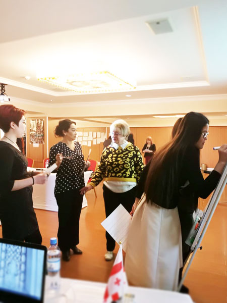 Women politicians work on their presentation